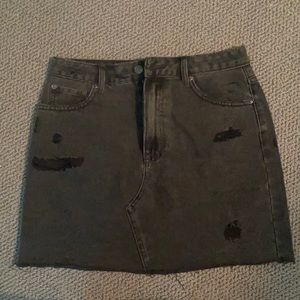 Black high-rise jean skirt.